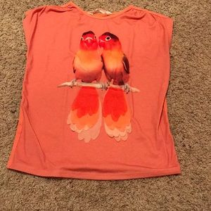 Girls pink parrot shirt with tassel things
